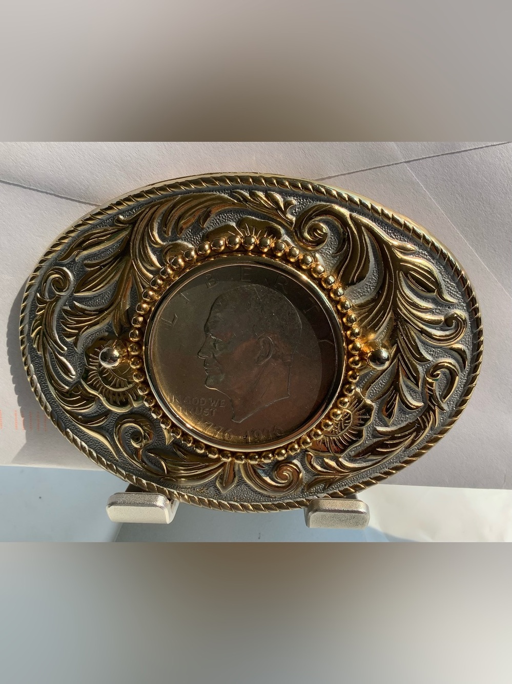 Vintage 1970s Eisenhower bicentennial dollar coin western belt buckle.